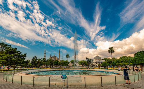 Panoramic view of swimming pool against sky