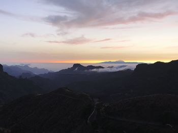 Scenic view of dramatic sky during sunset