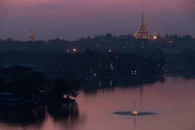 View of illuminated buildings at dusk