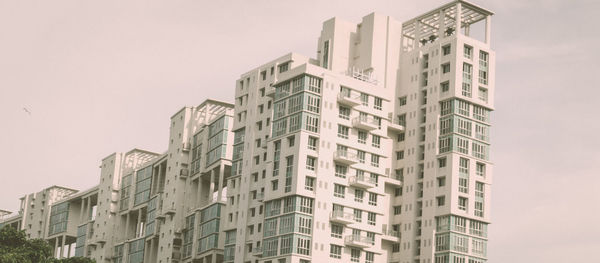 Low angle view of buildings against clear sky