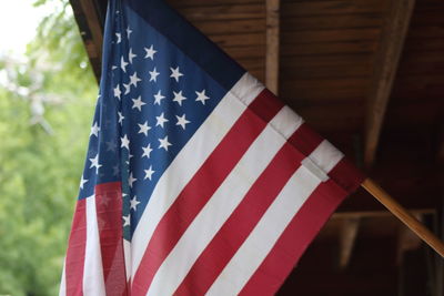 Close-up of flag against blue sky