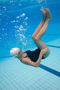 Woman swimming in pool