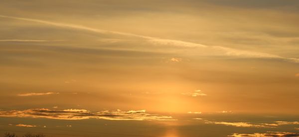 Low angle view of dramatic sky during sunset