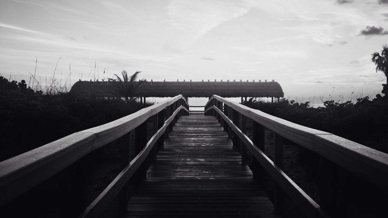 wood - material, railing, sky, tranquility, tranquil scene, boardwalk, the way forward, pier, wood, nature, scenics, wooden, beauty in nature, water, tree, wood paneling, jetty, lake, cloud - sky, footbridge