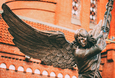 Low angle view of statue of historic building