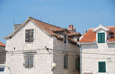 Low angle view of residential buildings against sky