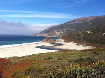 Scenic view of beach against sky