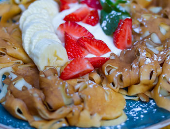 Close-up of chopped fruit salad in plate