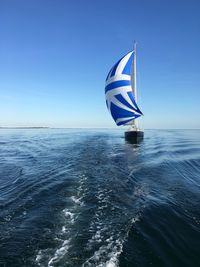 Boat sailing in sea