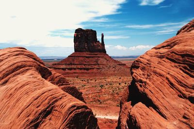 Scenic view of rock formations against sky