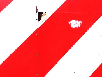 High angle view of red flag on wall