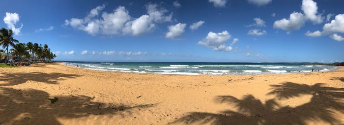 Panoramic view of beach against sky