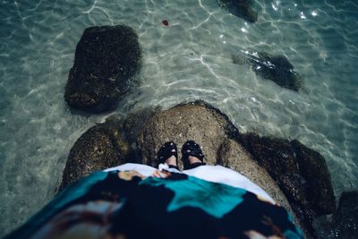 High angle view of people swimming in sea