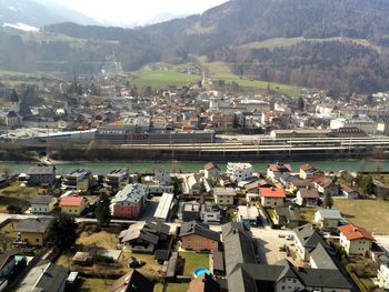 High angle view of town against mountains