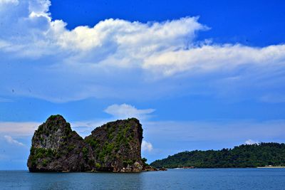 Scenic view of sea against blue sky