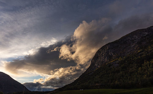 Low angle view of mountain against sky during sunset