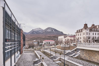 View of buildings in city against sky