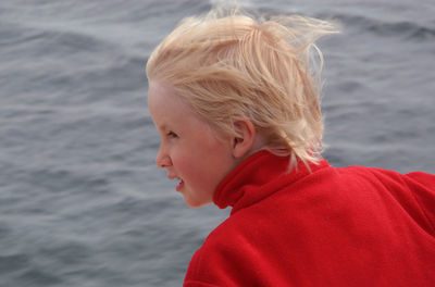 Portrait of boy looking away in water