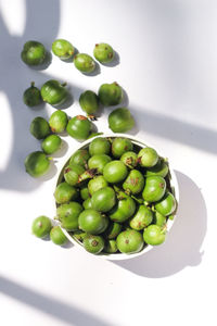 Close-up of grapes on white background