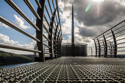 View of bridge in city against sky