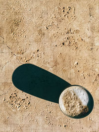 High angle view of coffee on surface