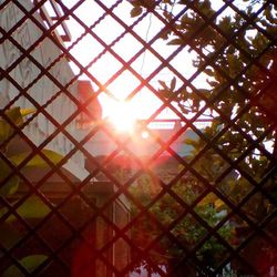 Chainlink fence seen through chainlink fence