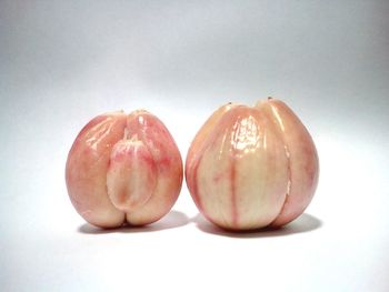 Close-up of apple against white background