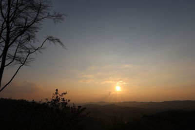 Scenic view of silhouette landscape against sky during sunset