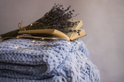 Close-up of book on table against gray background