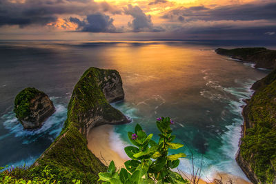 Scenic view of sea against sky during sunset