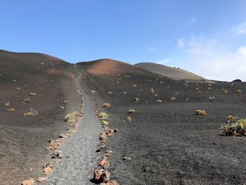 Scenic view of land against sky