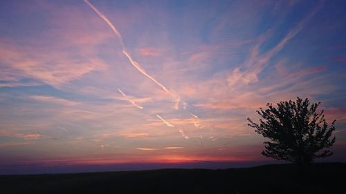 Scenic view of silhouette landscape against sky during sunset