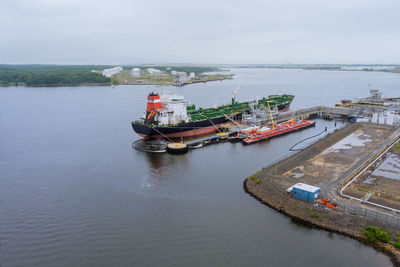 High angle view of ship moored on sea against sky