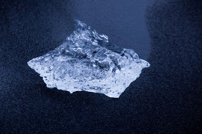 Close-up of ice on beach