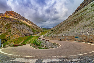 Panoramic view of road amidst mountains against sky