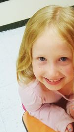 Close-up portrait of smiling girl