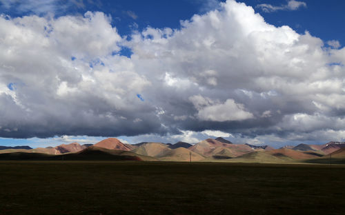 View of landscape against cloudy sky