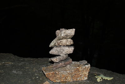 Stone wall against black background