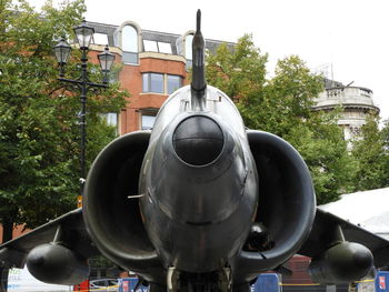 Close-up of vintage car against sky