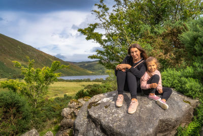 Family hiking in lough dan, wicklow mountains, ireland