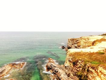 Scenic view of sea against clear sky