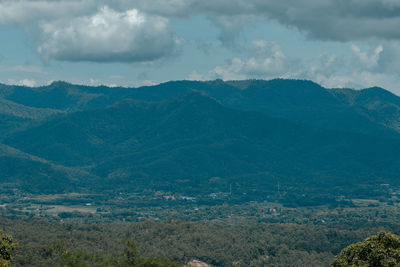 High angle view of townscape and mountains against sky