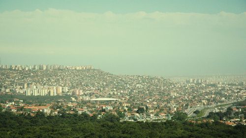 High angle view of townscape against sky in city