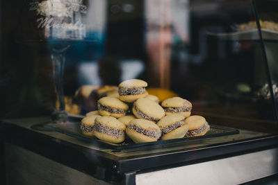 Close-up of macaroons for sale at bakery