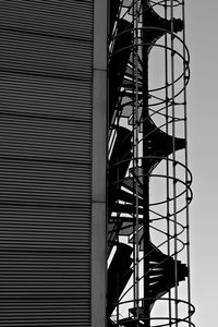 Low angle view of spiral staircase against building