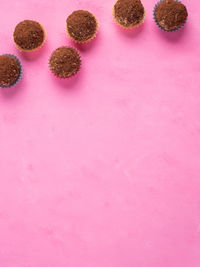 High angle view of pink candies on table