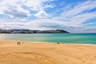 Scenic view of beach against sky