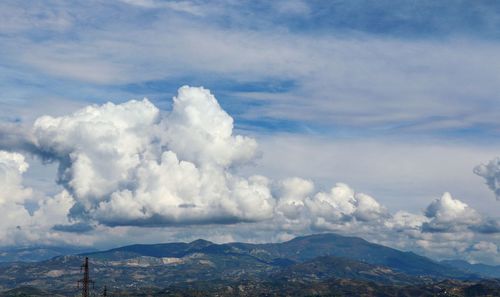 Scenic view of clouds over mountain