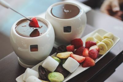 Close-up of strawberry in chocolate sauce