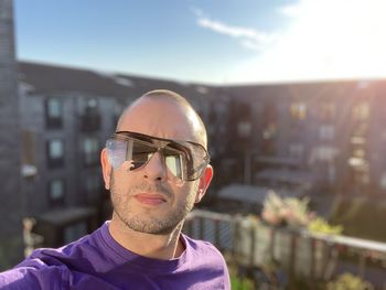 Portrait of young man wearing sunglasses